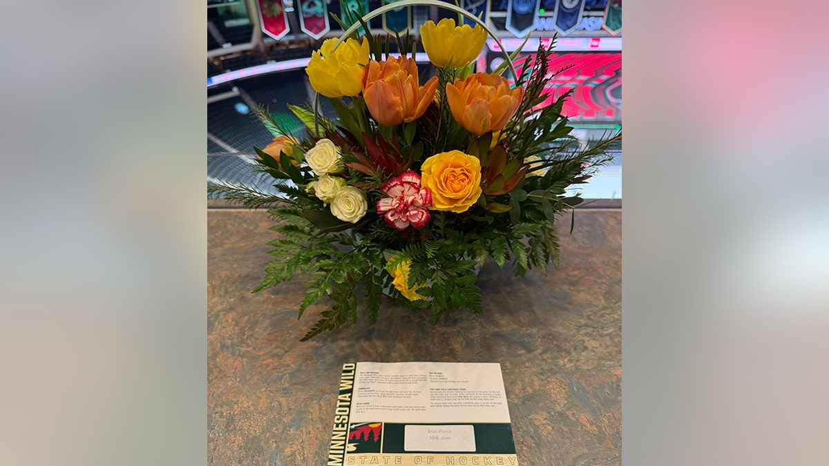 Flowers sit at a Minnesota Wild game