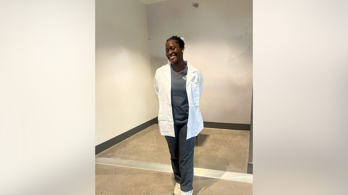 Oluwalayomi Fadero in nursing uniform