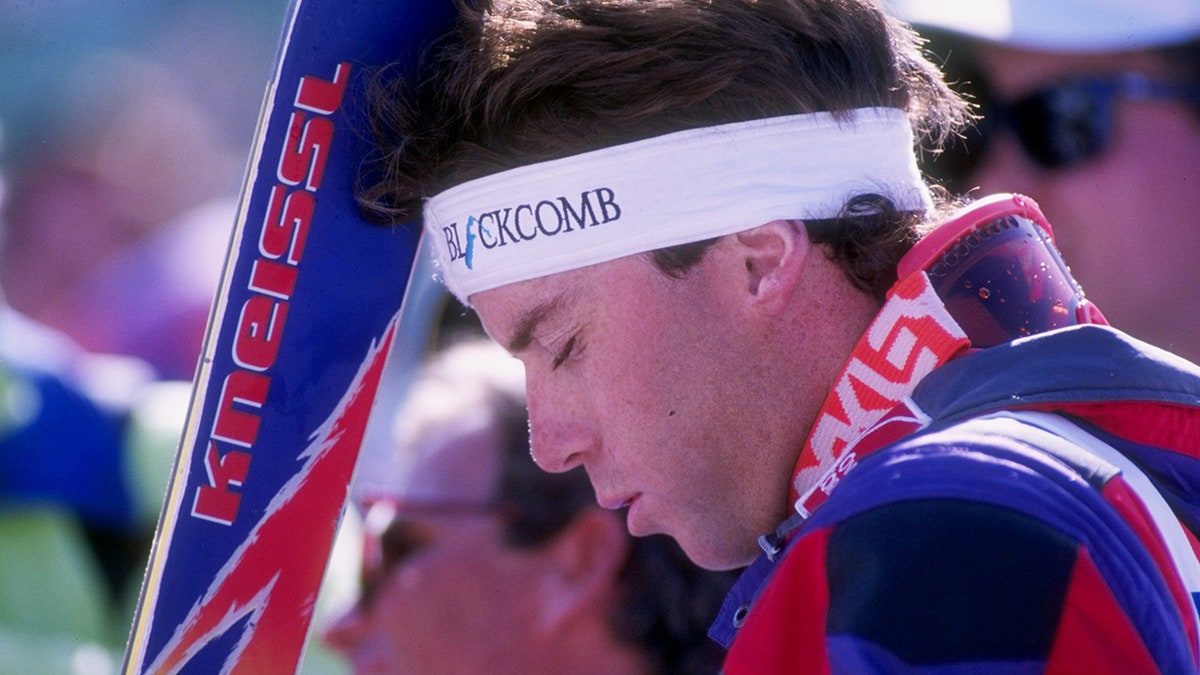 John Smart bows his head