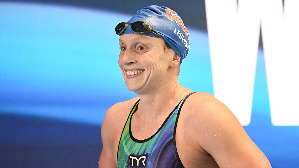 Katie Ledecky on the podium after a 2025 meet