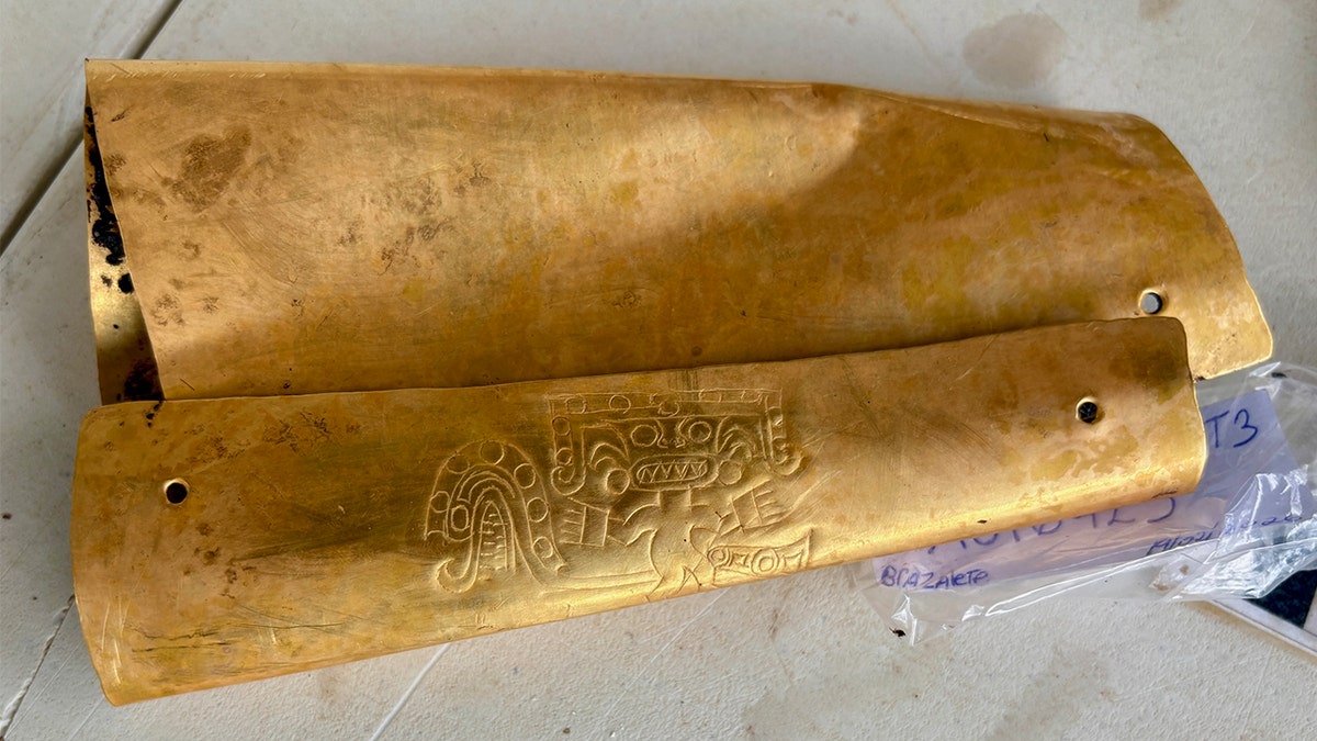 Gold arm band from tomb