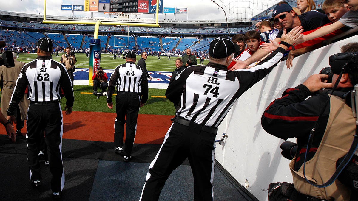 Fans greet NFL refs