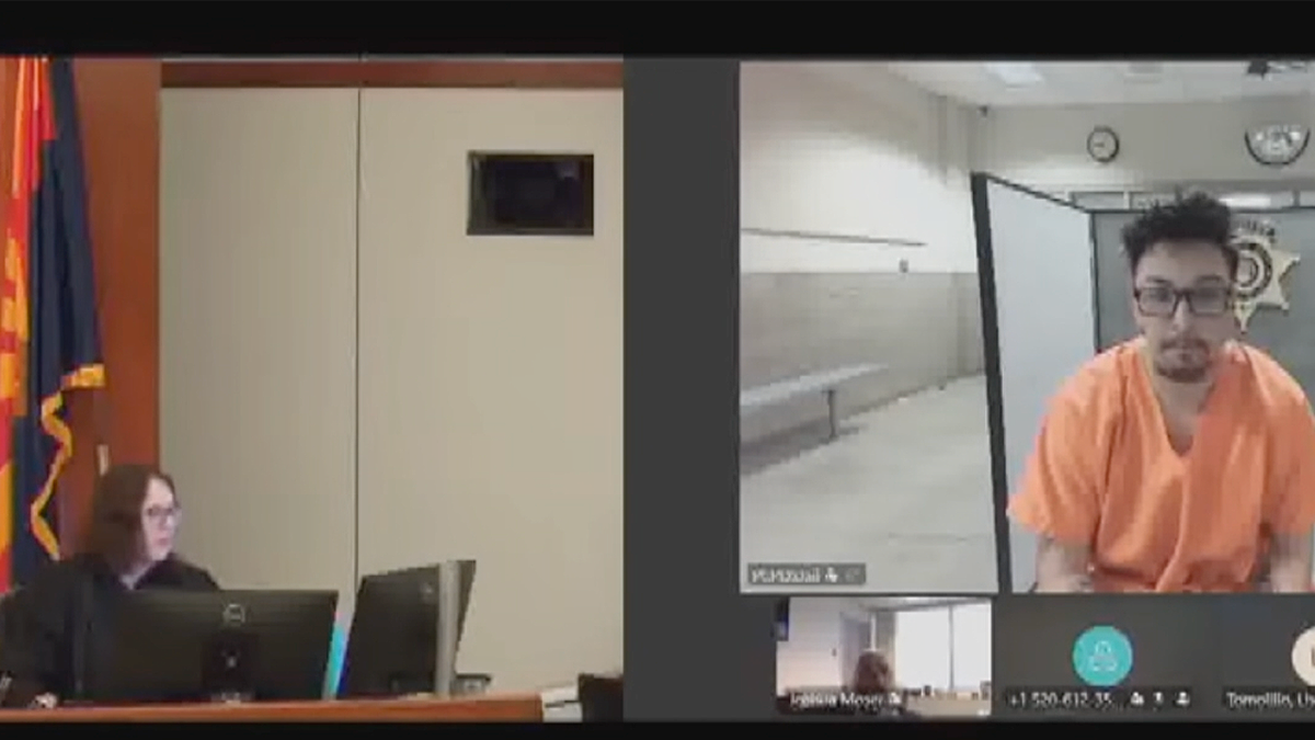 Courtroom view of Travis Reynolds appearing before a judge during his initial appearance in Pima County, Arizona