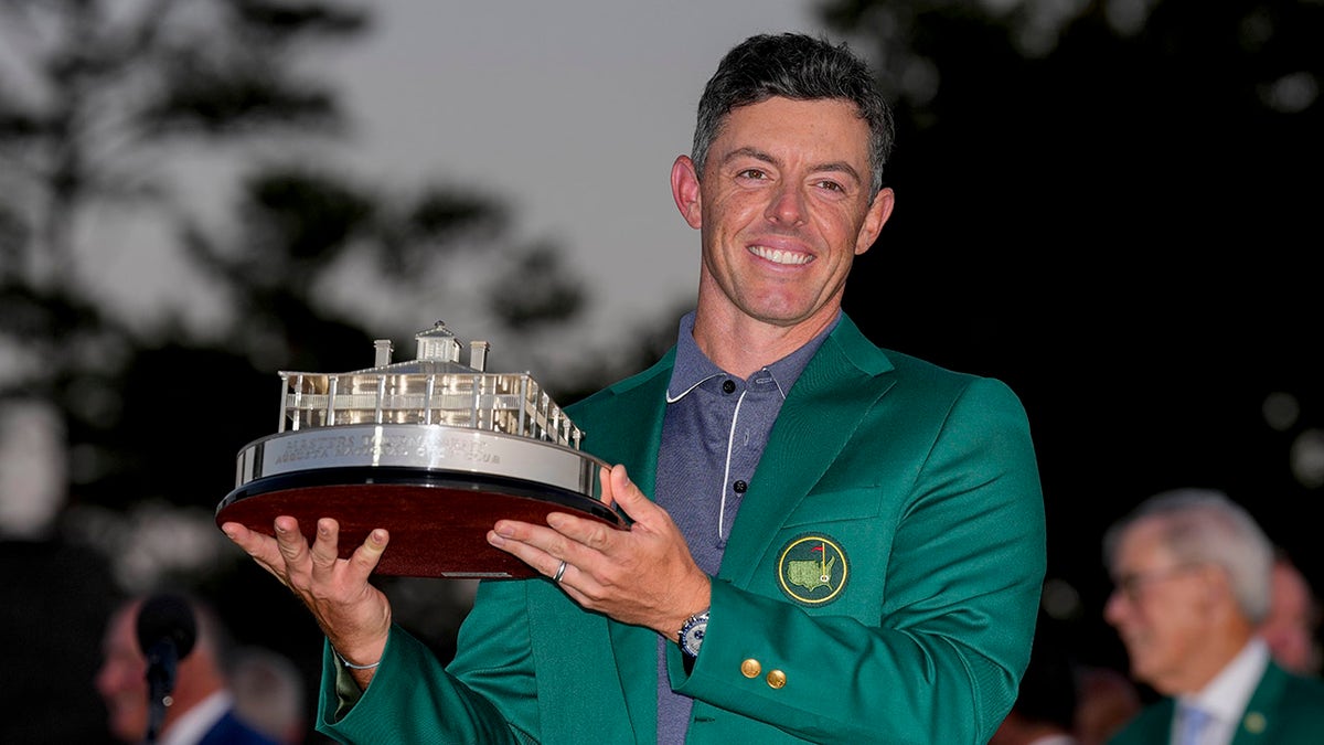 Rory McIlroy with Masters trophy