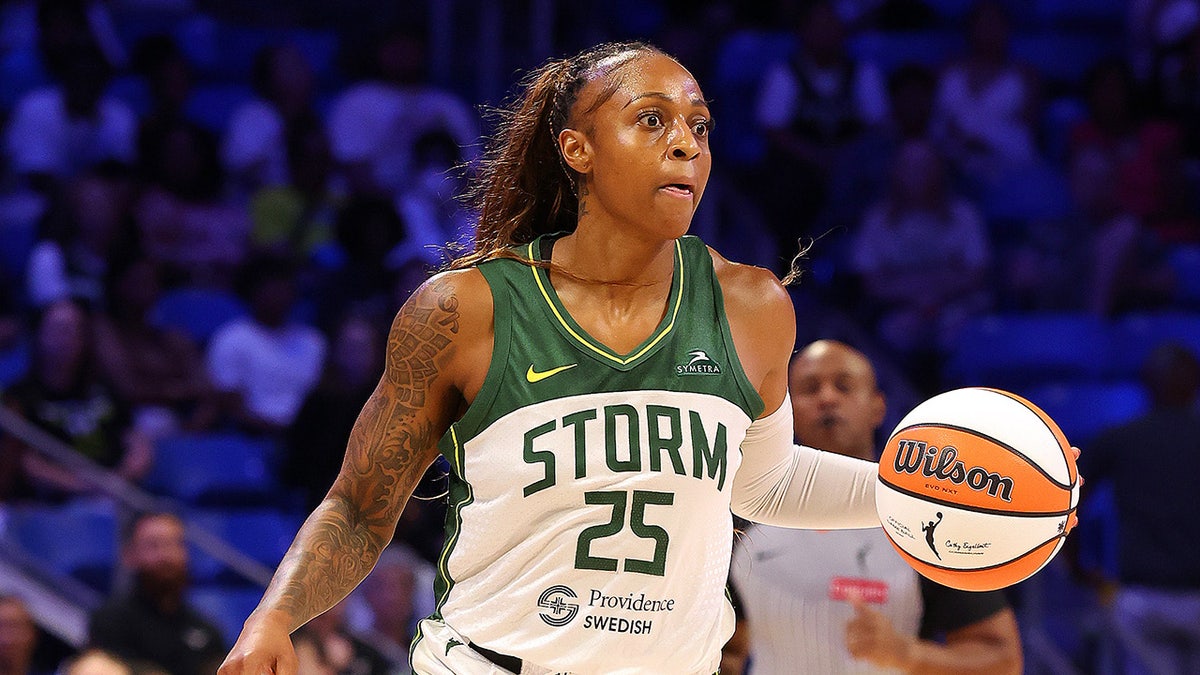 Tiffany Mitchell dribbles