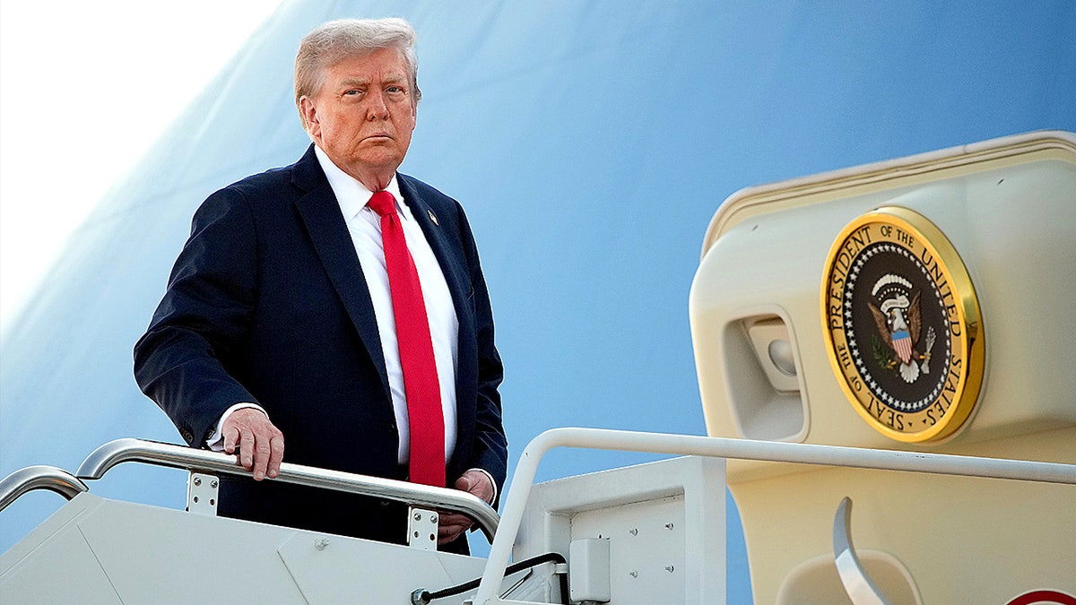 President Donald Trump boards Air Force One en route to Anchorage, Alaska, for peace talks with Russian President Vladimir Putin on the war in Ukraine.