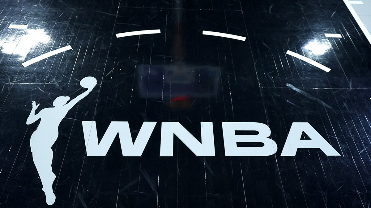 A WNBA logo is shown on the court