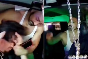 Shocking moment tank top wearing thug batters Uber driver, demands he drive