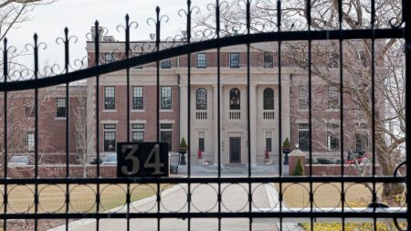 Police hunt armed suspect after housekeeper bound, attacked in luxury mansion heist: report