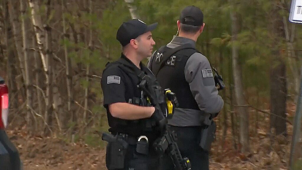 Massive manhunt underway in New Hampshire town after gunman allegedly wounds police officer, fires on family Massive manhunt underway in New Hampshire town after gunman allegedly wounds police officer, fires on family