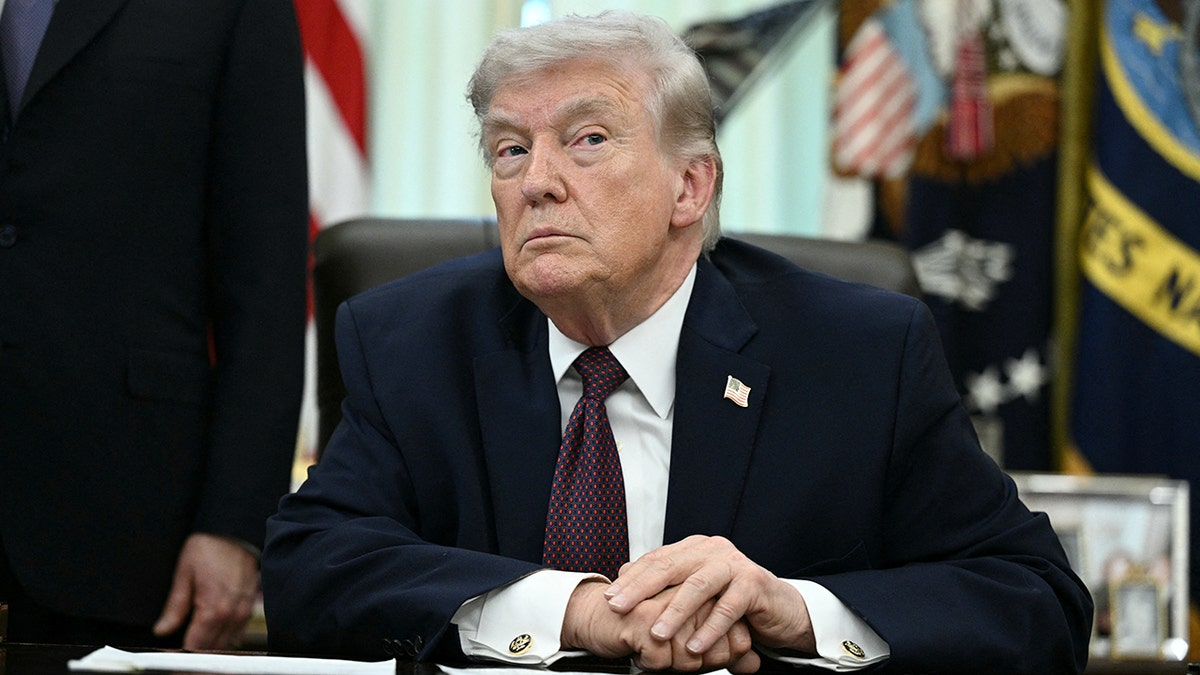 US President Donald Trump answering a question in the Oval Office