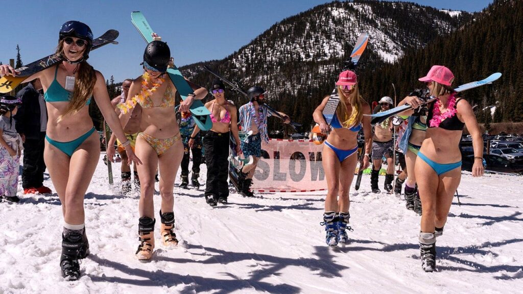 Bikini skiing takes off on slopes as record warmth forces resorts into survival mode