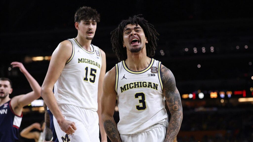 Michigan holds off UConn to capture first men’s basketball national title since 1989