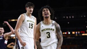 Michigan holds off UConn to capture first men’s basketball national title since 1989