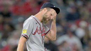 Braves ace Chris Sale slams baseball against his head after walking the bases loaded in wild scene Braves ace Chris Sale slams baseball against his head after walking the bases loaded in wild scene