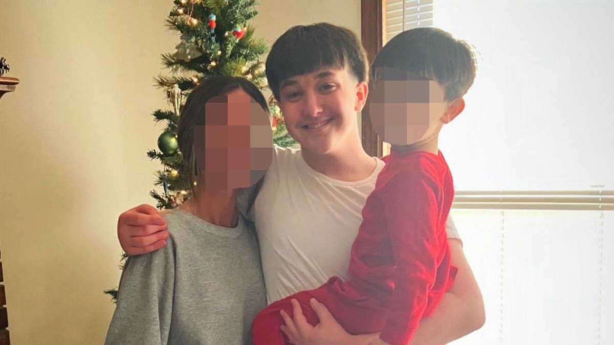 Miles Young with family members in Missouri prior to fatal ambush