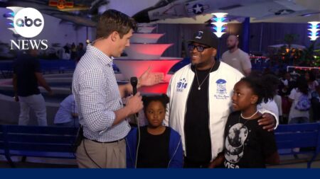 Fraternity brother of Artemis II pilot Victor Glover reacts after splashdown
