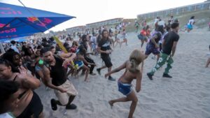 Police flood Orange Crush island hot spot, warn of teen takeovers as beach bash madness returns