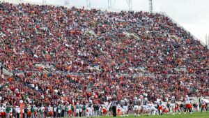 Skydiver’s parachute gets stuck on scoreboard at Virginia Tech spring game in harrowing scene