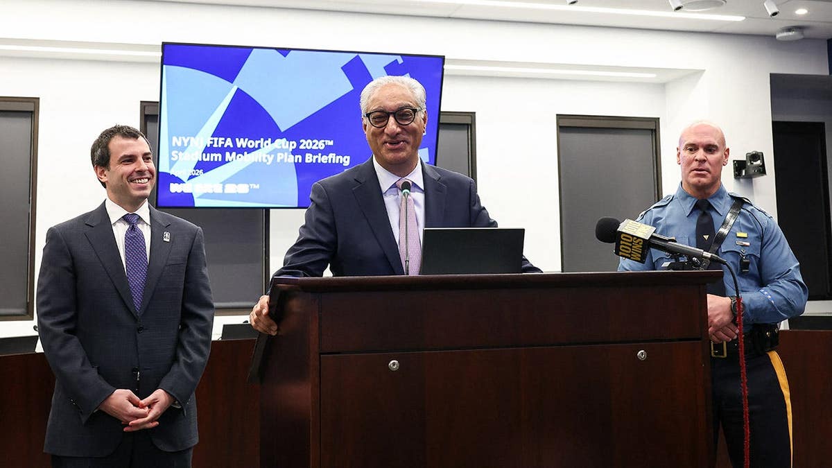 NJ Transit CEO Kris Kolluri speaking with Alex Lasry at a press briefing in Newark, New Jersey