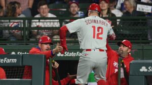 Phillies players scatter as rat runs along dugout during another loss, extending seven-game skid