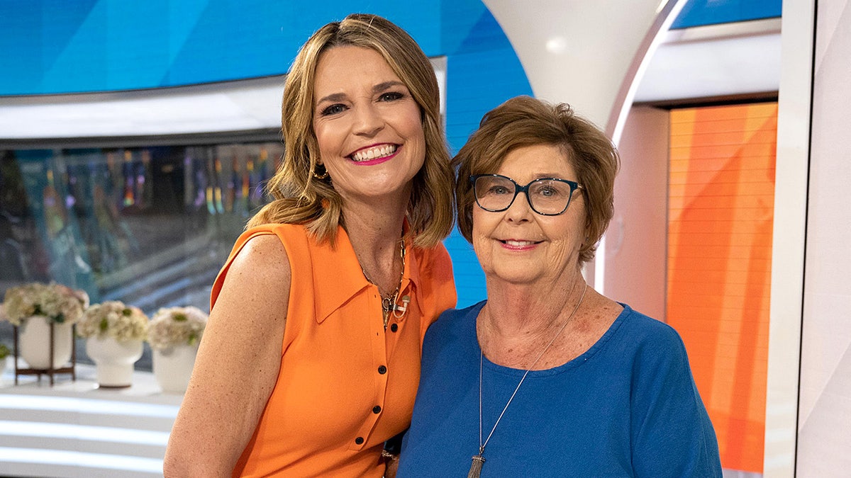 Savannah Guthrie standing beside her mother Nancy Guthrie posing for a photo.