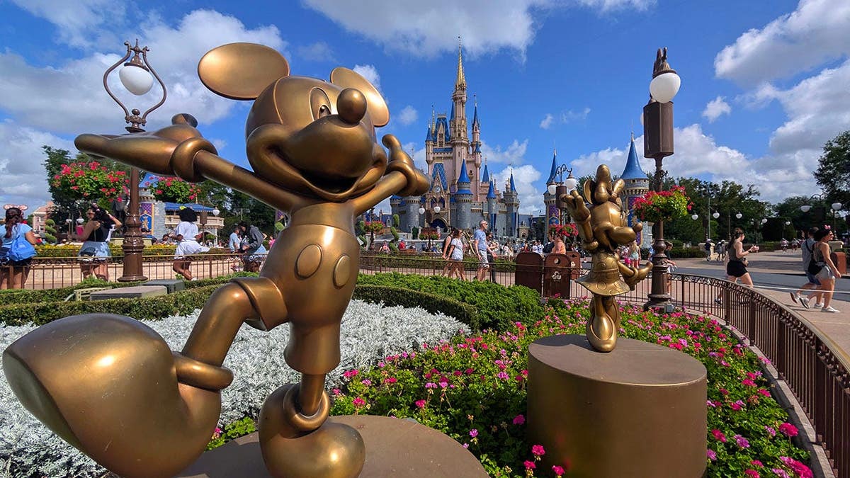 Statues of Mickey Mouse and Minnie Mouse at Magic Kingdom in Orlando, Florida