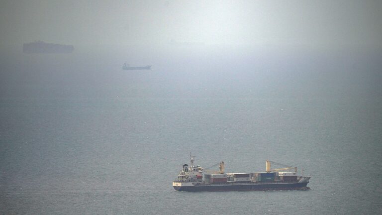 Cargo ship attacked by small craft near Strait of Hormuz, UK maritime agency says