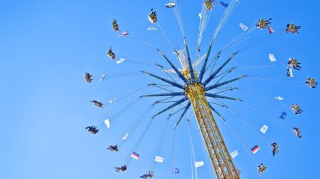 Startling footage from amusement park shows thrill ride halted as guests wait in midair