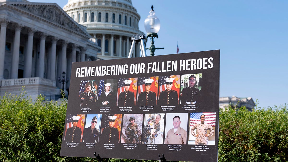 House Foreign Affairs Committee Chairman Michael McCaul standing by display of fallen American military members at Capitol