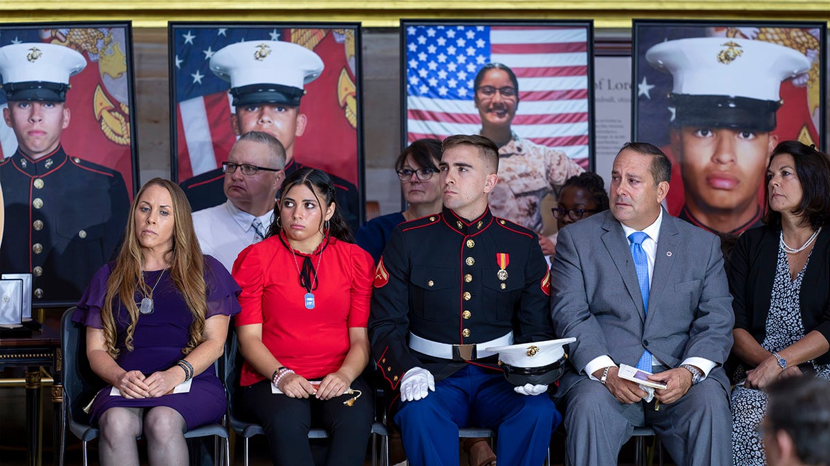 Families of American service members listening to Congressional leaders at the Capitol in Washington