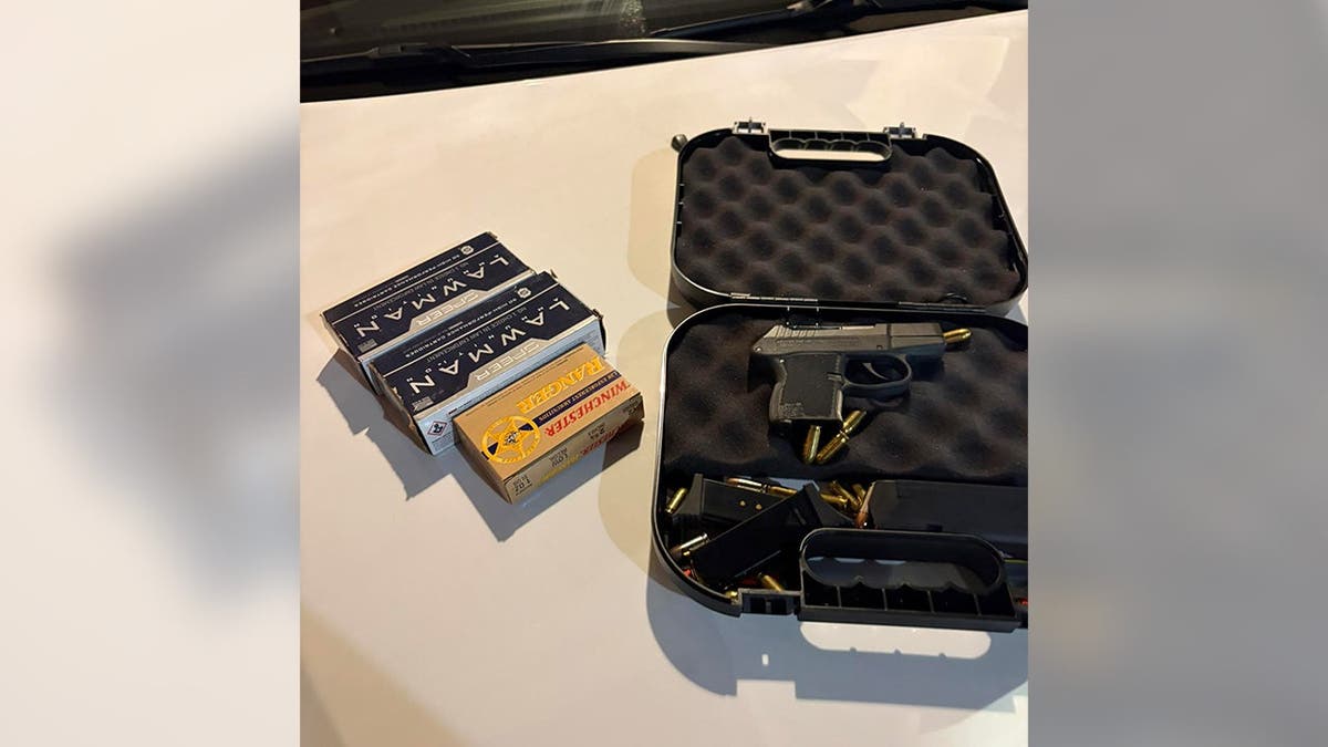 A handgun and ammunition from the suspect