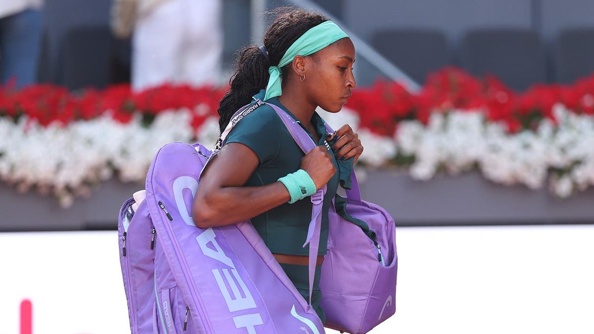 Coco Gauff walks off the tennis court in Madrid