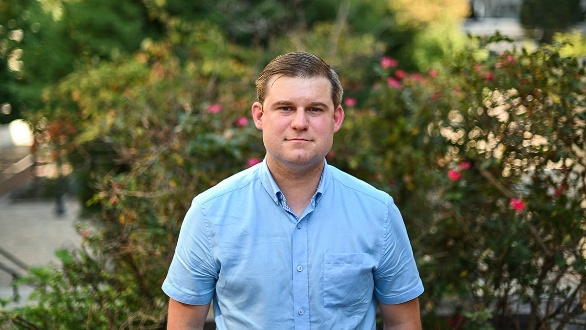 Garrett Ziegler standing outside the J. Caleb Boggs Federal Building in Wilmington, Delaware