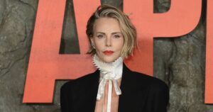 Charlize Theron Goes Topless Under Blazer and Shows Off Major Underboob at ‘Apex’ Premiere