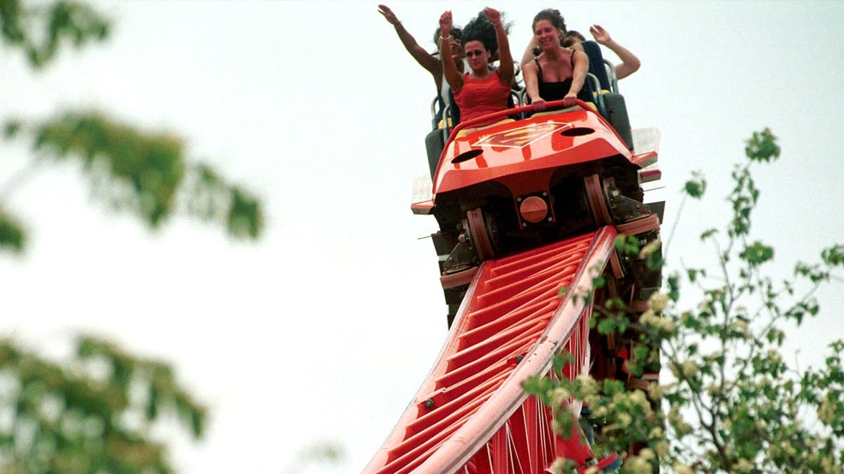 Guests riding Superman rollercoaster in 200