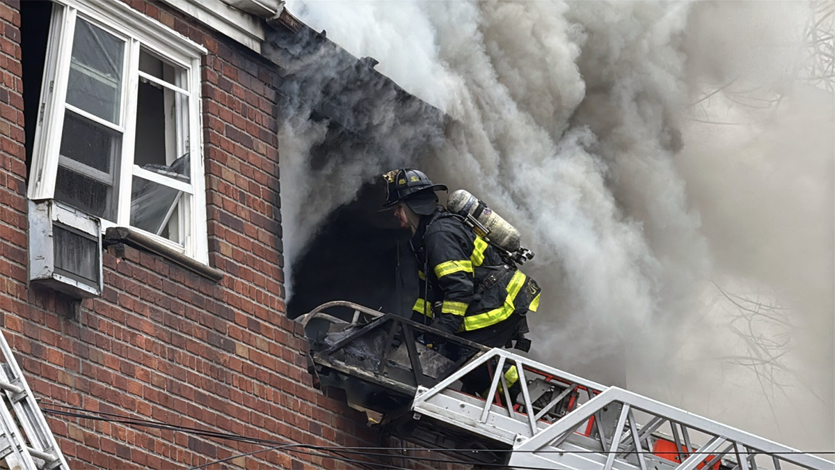 Smoke was seen coming through the windows of the building as FDNY firefighters battled the blaze on March, 16, 2026.