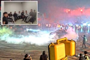 Over 200 swarm Atlanta intersection in illegal street takeover roaring with cars racing and doing donuts