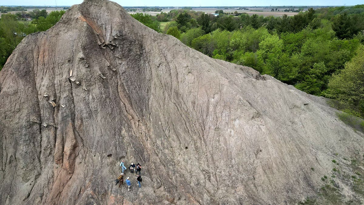 View of researchers standing on Mazon Creek fossil beds