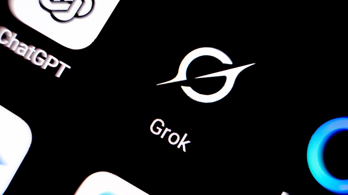 The Grok application displayed on a smartphone screen held in a hand