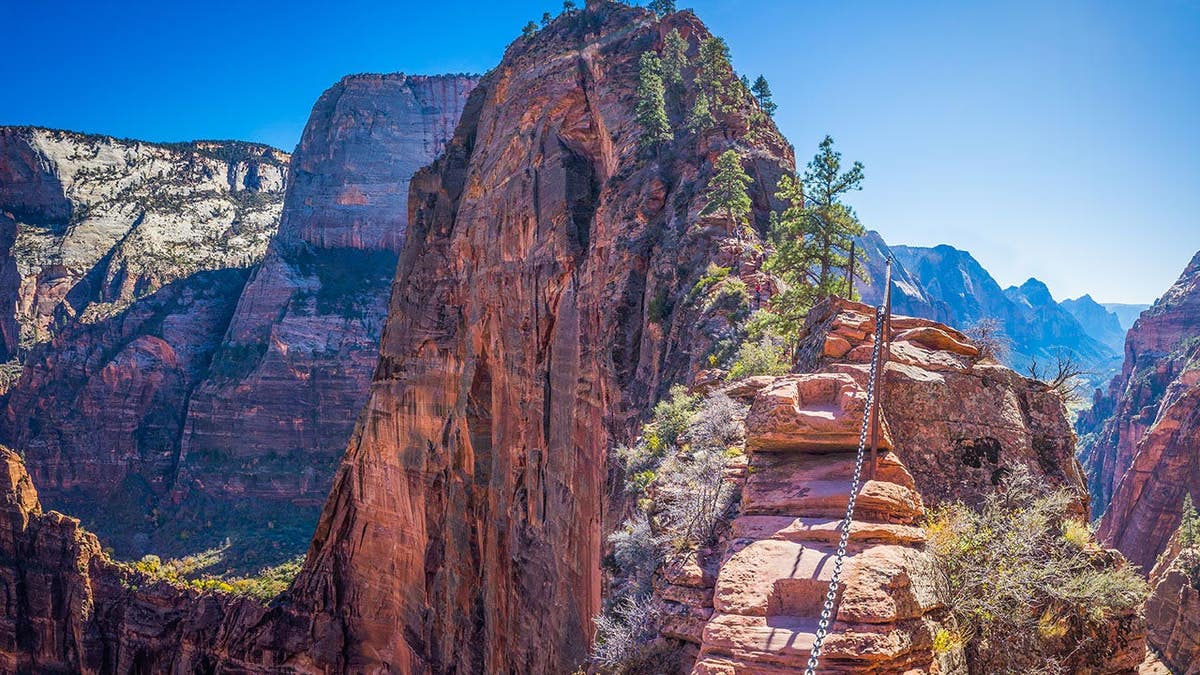 View from Angel's Landing trail showing rocky ridge above canyon floor in Zion National Park Utah