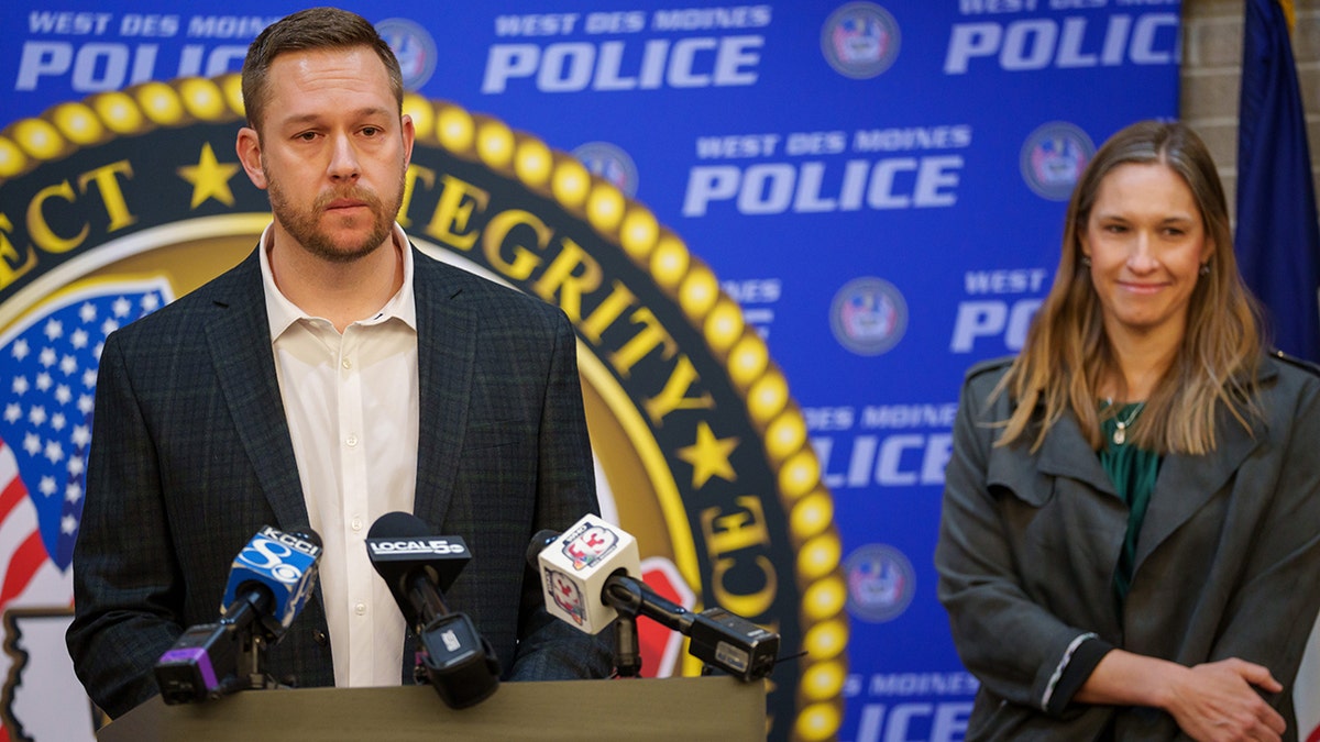 Ashley Okland's siblings Josh Okland and Brittany Bruce speaking at West Des Moines Police Department