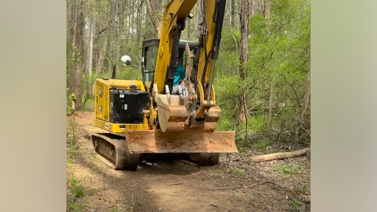 Excavator used in search for human remains near South Carolina creek