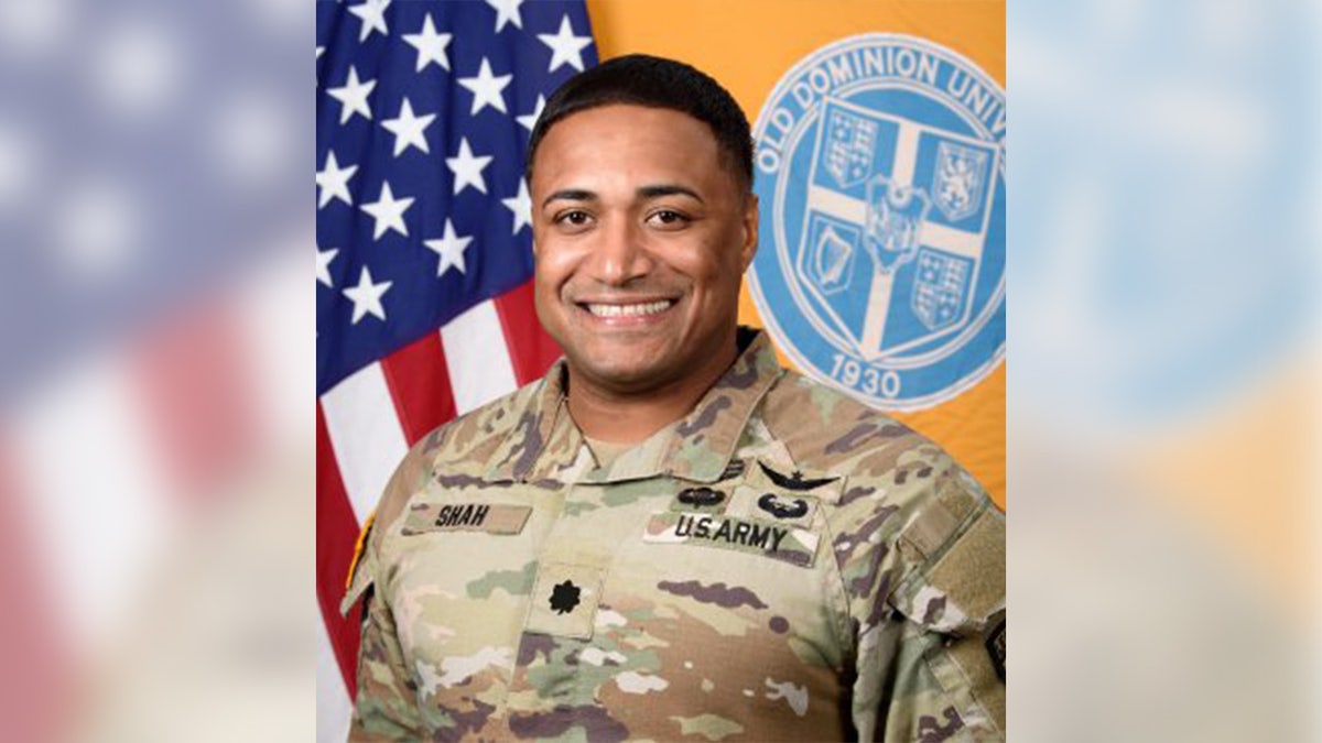 Lt. Col. Brandon Shah wearing military uniform and glasses