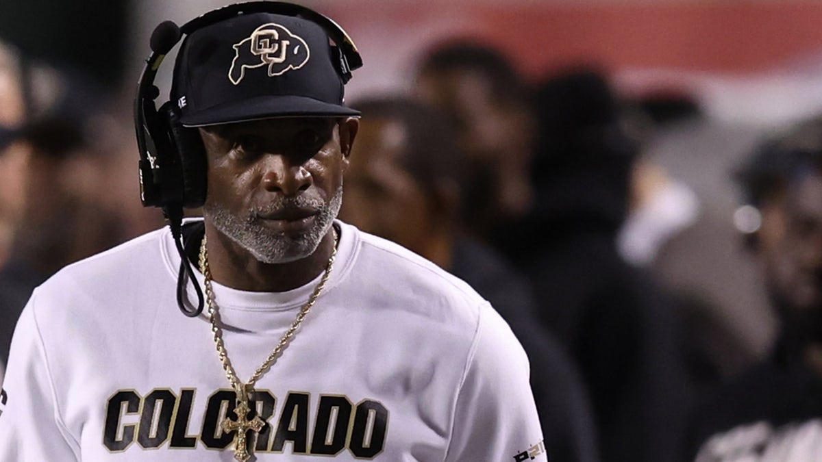 Colorado Buffaloes head coach Deion Sanders looking on during a timeout at Rice-Eccles Stadium