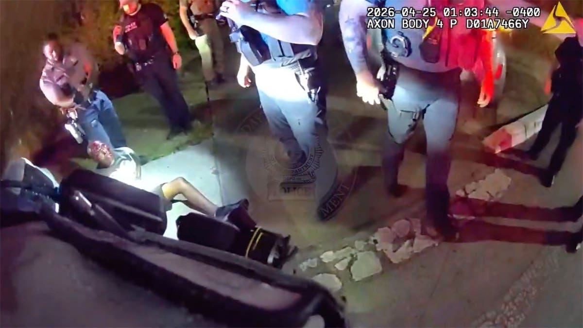 Cory Acree being taken into custody by police officers in Daytona Beach Florida