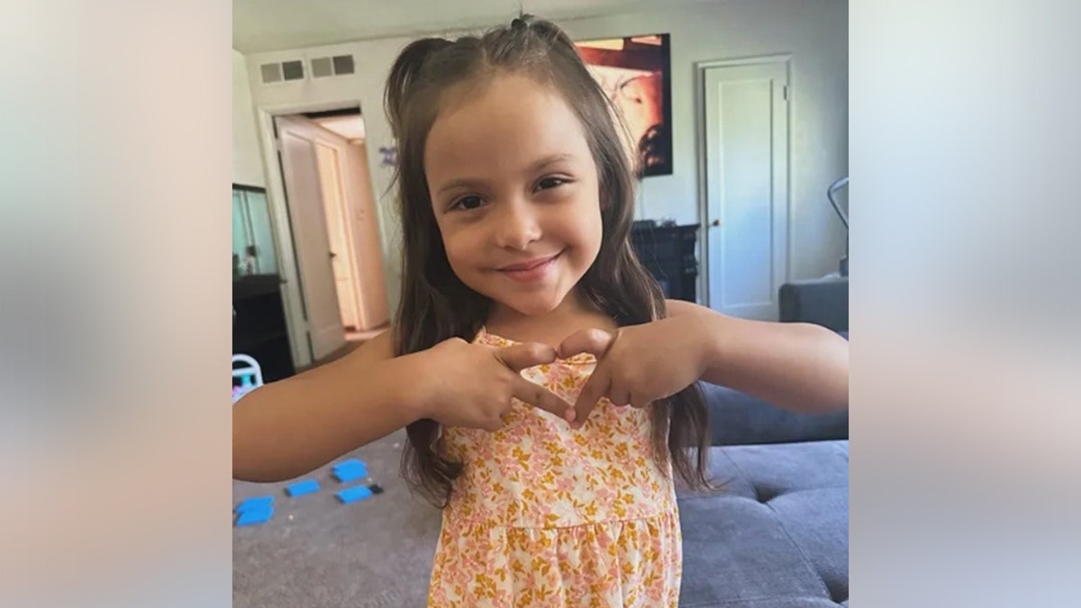 Dalilah Coleman standing and looking at the camera