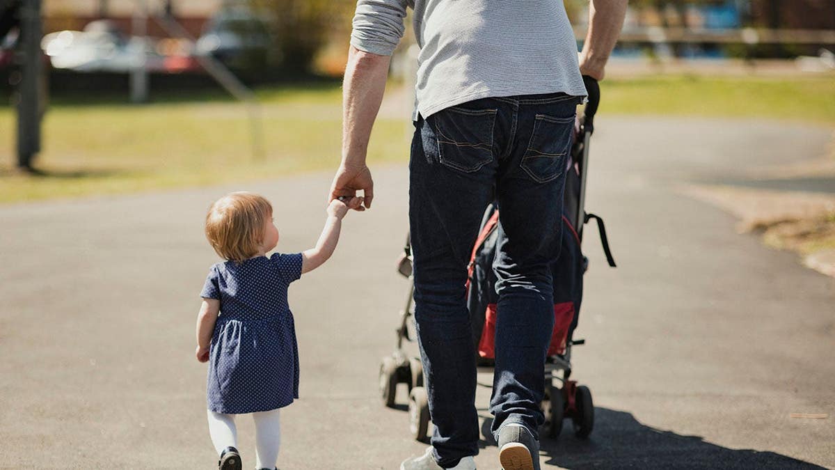 Man pushing a stroller