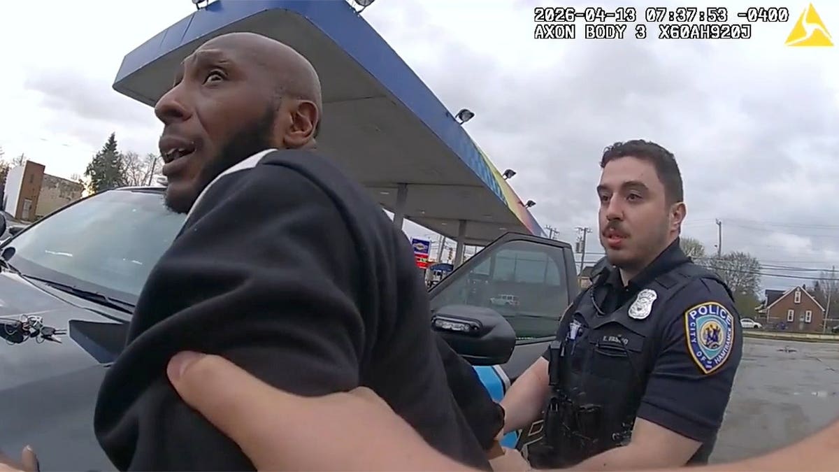 Donald James Fields being arrested by police officers in Hamtramck Michigan