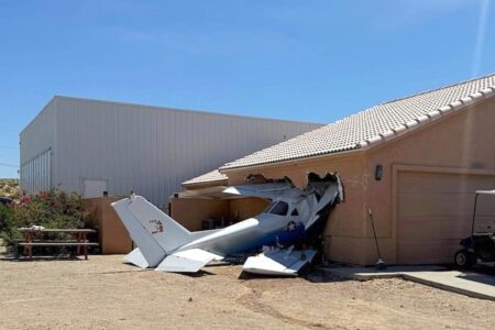 Small plane crashes into side of Arizona home after veering off airport runway, leaving 2 people hospitalized